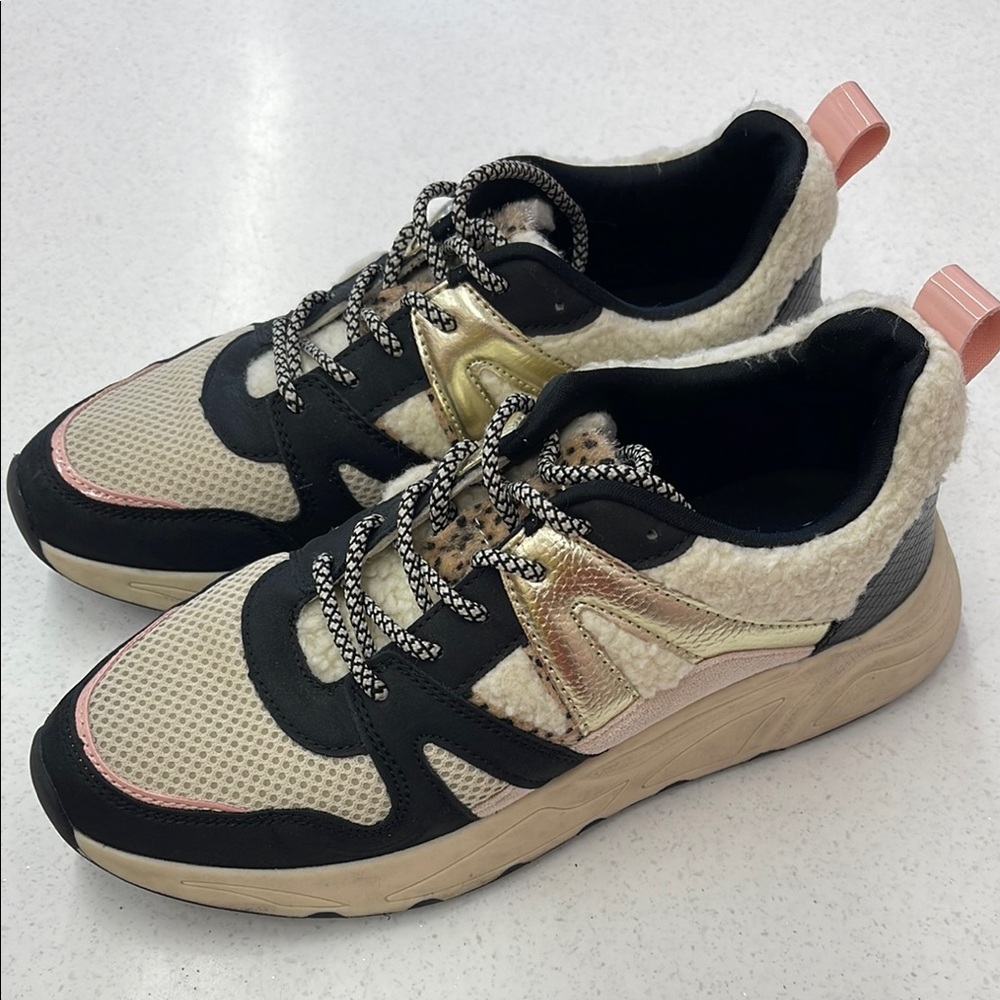 Posh Black and Gold Sneakers with Chunky Design